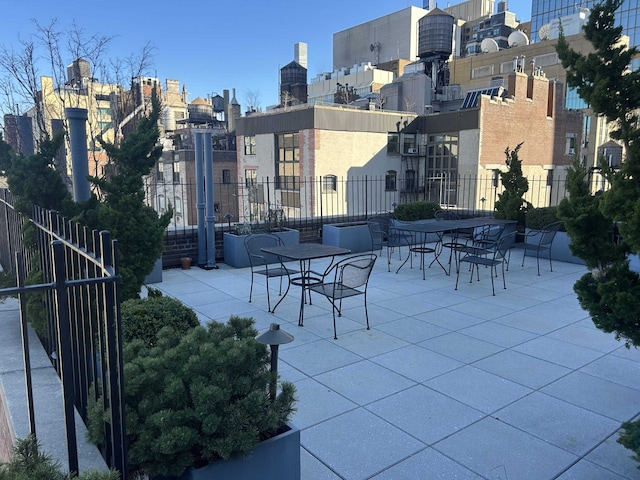 60 W 68th St Unit 4-Fg, New York City, NY 10023 - view of patio / terrace featuring a view of city and fence