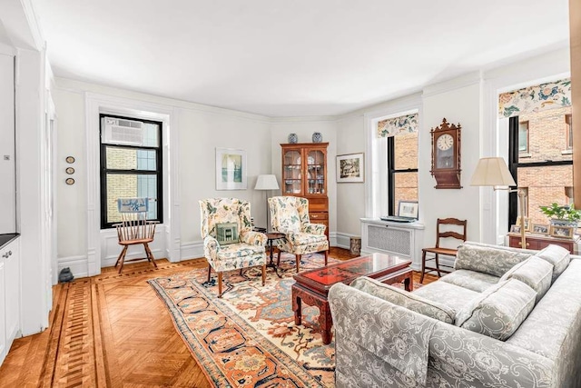 living room with light parquet floors and a wealth of natural light