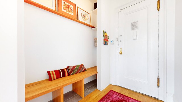 interior space featuring parquet floors and radiator heating unit