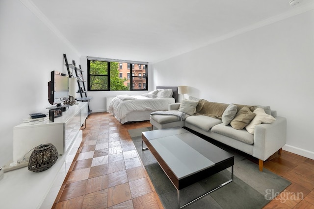 bedroom with hardwood / wood-style floors and ornamental molding