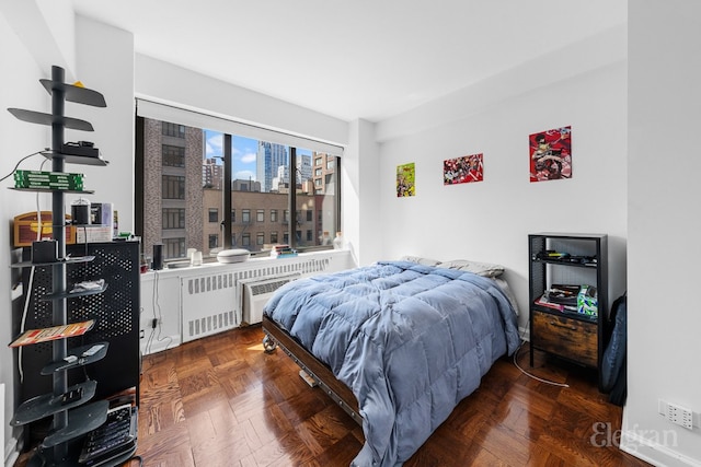 bedroom featuring radiator