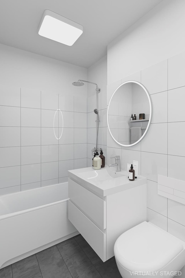40 E 84th St Unit 4A, New York City, NY 10028 - bathroom with tile walls, tub / shower combination, vanity, tile patterned flooring, and toilet