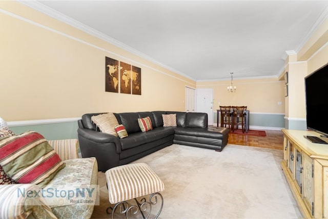 living room with crown molding, parquet floors, and a chandelier