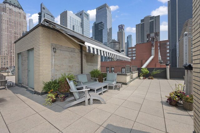 view of patio with a view of city