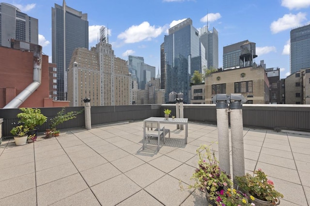 view of patio / terrace featuring a view of city