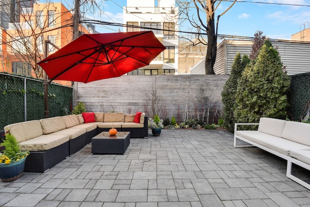 view of patio / terrace featuring outdoor lounge area and a fenced backyard