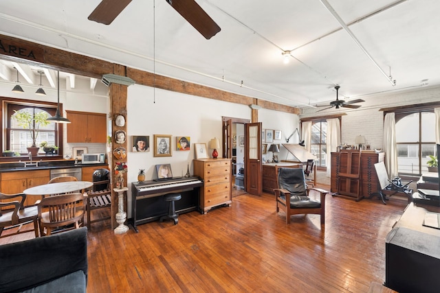 210 Spring St Unit 5Fl, New York City, NY 10013 - living room with a ceiling fan, plenty of natural light, and hardwood / wood-style floors