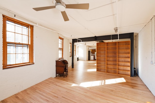 210 Spring St Unit 5Fl, New York City, NY 10013 - unfurnished room with wood finished floors and a ceiling fan