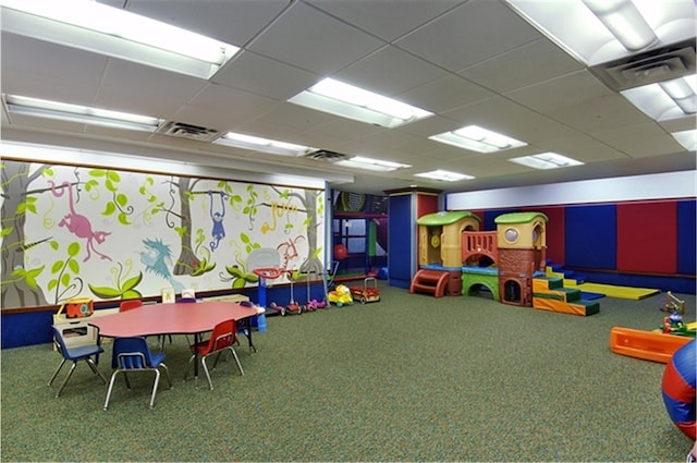 game room featuring visible vents and a drop ceiling