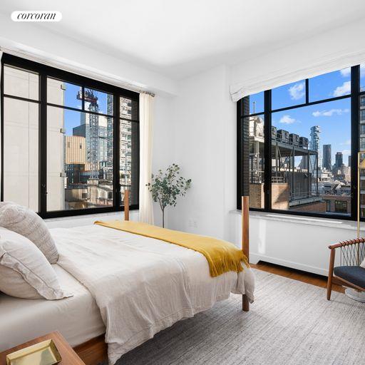 bedroom with hardwood / wood-style flooring