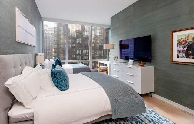 bedroom featuring light wood-type flooring