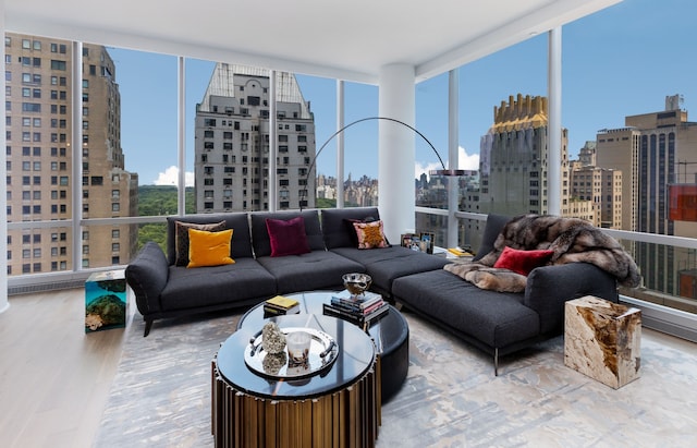 sunroom / solarium with a view of city