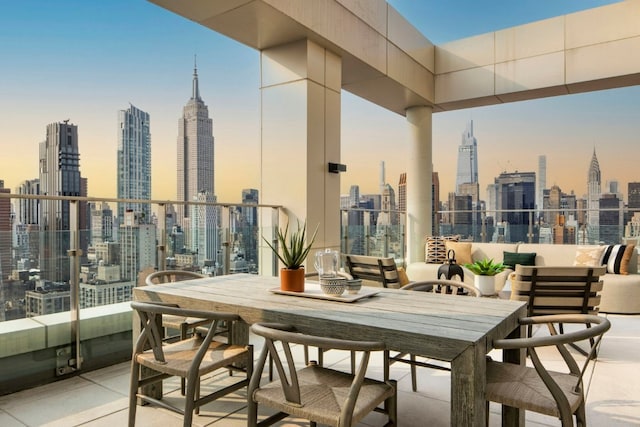 exterior space featuring a balcony and an outdoor hangout area