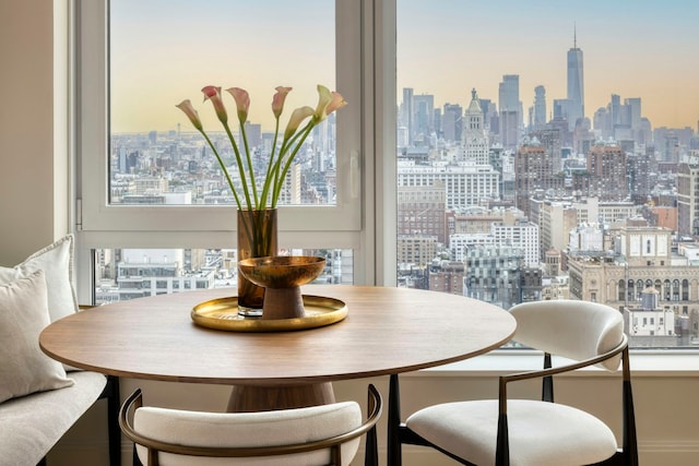 dining space featuring a city view