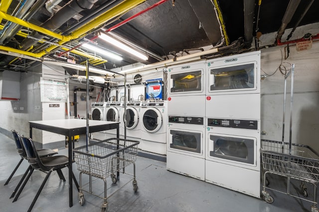 washroom with stacked washer and dryer and separate washer and dryer