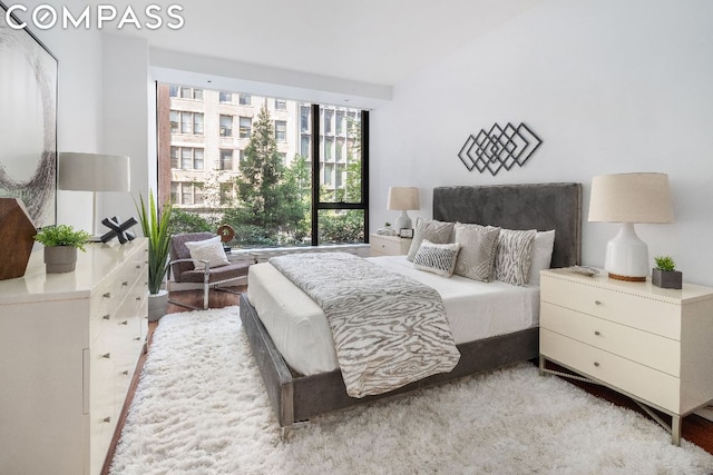 bedroom with light hardwood / wood-style floors