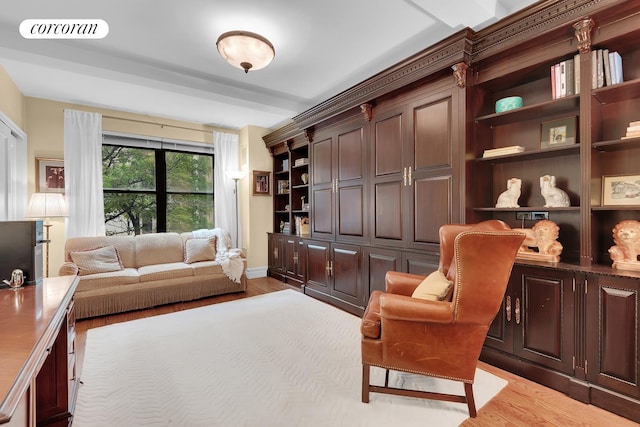 sitting room with light wood finished floors and visible vents