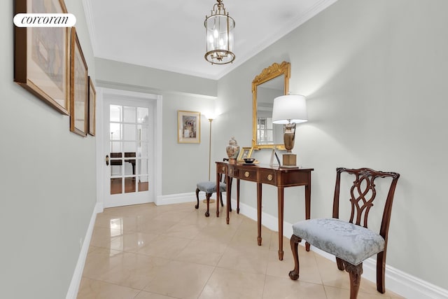 hallway featuring crown molding, baseboards, and a chandelier