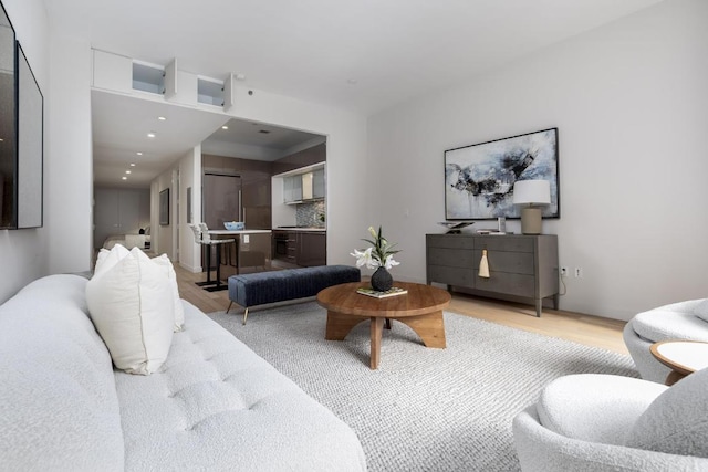 living room with light hardwood / wood-style floors