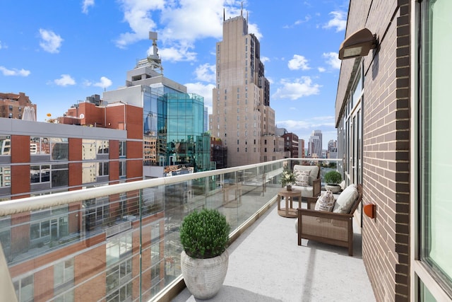 balcony featuring a view of city