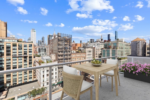 balcony featuring a city view