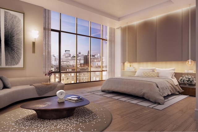 bedroom featuring floor to ceiling windows, a city view, and wood finished floors