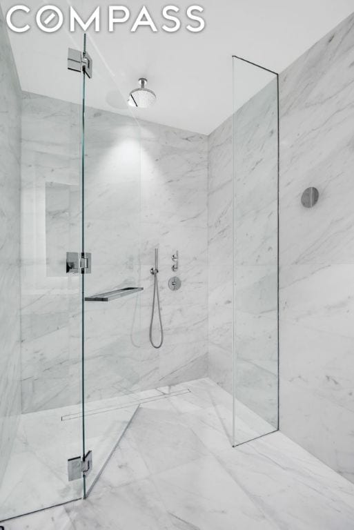 bathroom with walk in shower