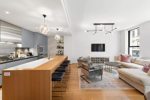 living room with light wood-style flooring