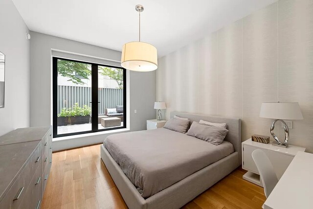 bedroom with light wood-style floors
