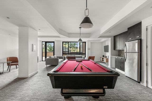 game room featuring a tray ceiling, carpet, and billiards