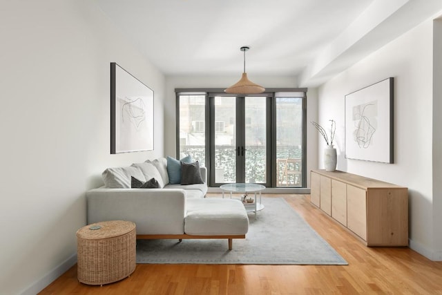 sitting room with light hardwood / wood-style floors