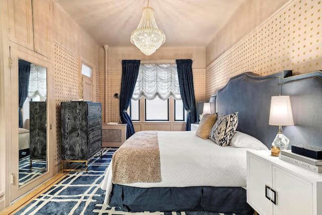 bedroom featuring a chandelier