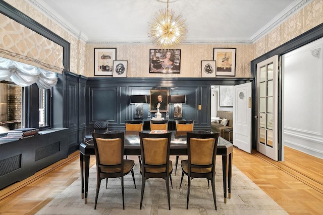 dining area with parquet floors, an inviting chandelier, and ornamental molding