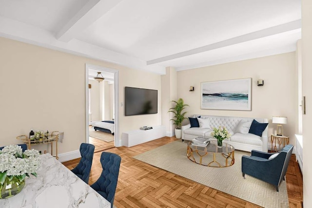 living room with light parquet floors and beamed ceiling