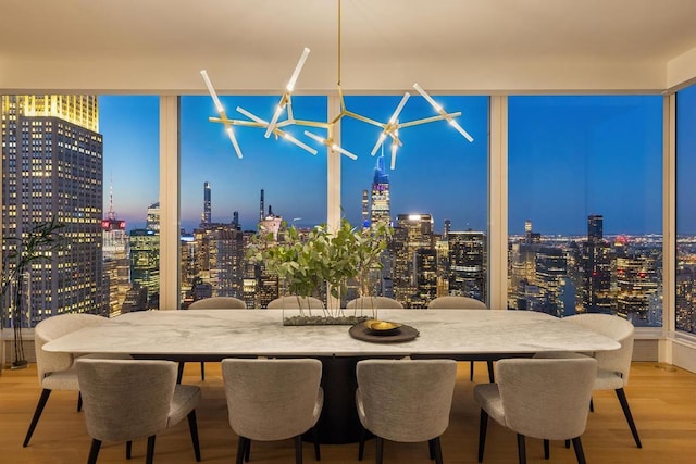 dining area with hardwood / wood-style floors