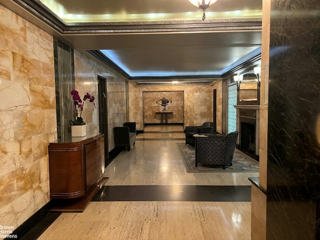 bathroom featuring ornamental molding, an enclosed shower, and tile walls