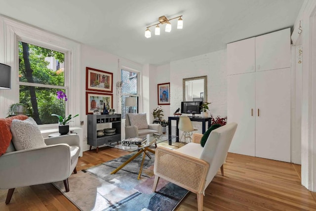 sitting room with light hardwood / wood-style floors