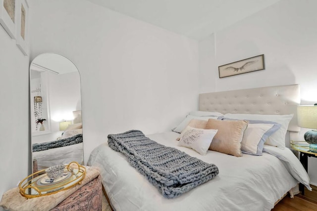 bedroom featuring hardwood / wood-style floors