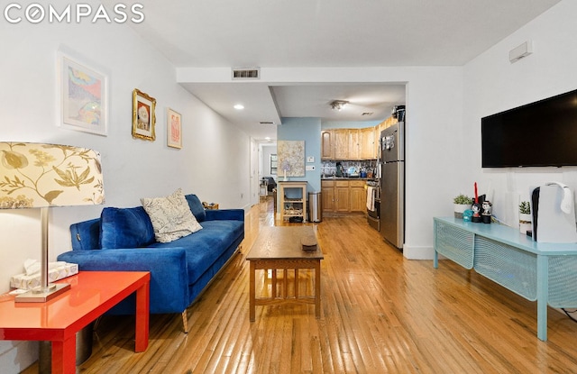 living room featuring light hardwood / wood-style floors