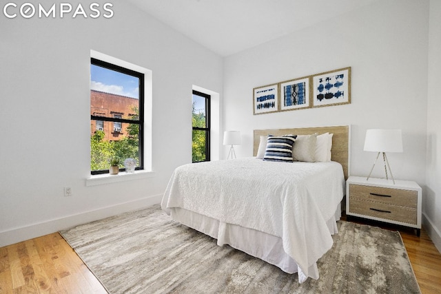 bedroom featuring wood-type flooring