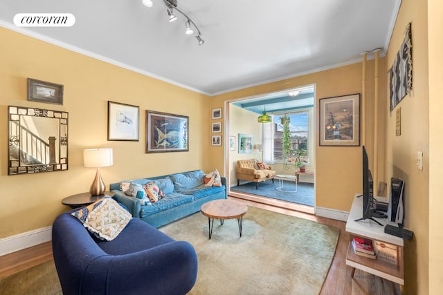 bedroom with radiator heating unit and hardwood / wood-style floors