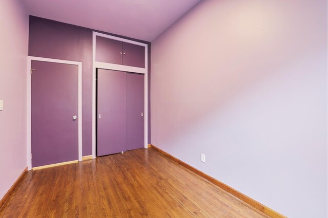 146 W 82nd St Unit 3A, New York City, NY 10024 - unfurnished bedroom with wood finished floors, baseboards, and a closet
