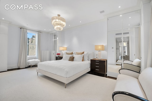 bedroom featuring an inviting chandelier, recessed lighting, visible vents, and ornamental molding