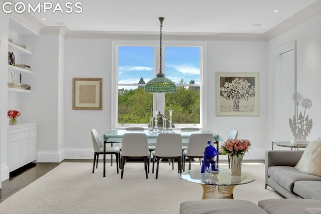 dining room featuring ornamental molding