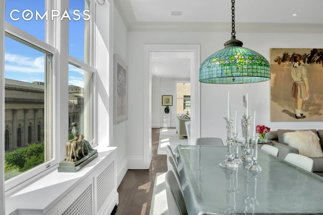 dining space with visible vents, baseboards, and dark wood-style flooring