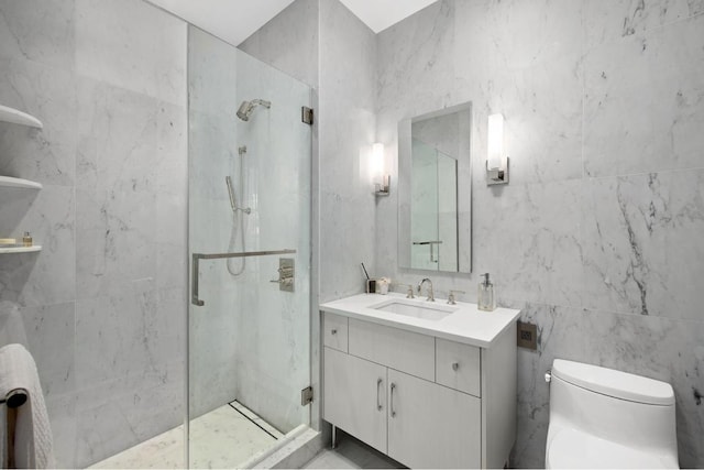 bathroom with toilet, vanity, tile walls, and walk in shower