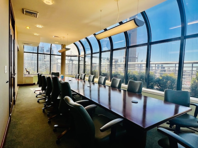 interior space featuring a view of city and visible vents