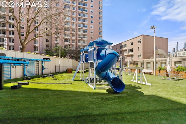 view of playground featuring a yard