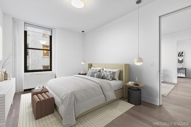 bedroom featuring hardwood / wood-style flooring