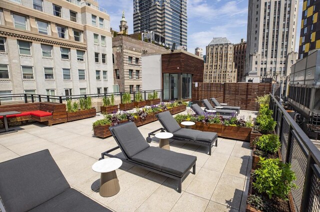 view of patio / terrace with a city view